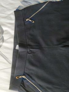 Chic Black Pants with Gold Zippers