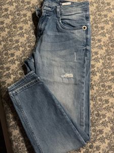 Stylish Distressed Blue Jeans