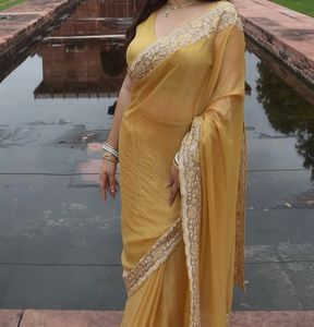 Elegant Yellow Saree with Delicate Border