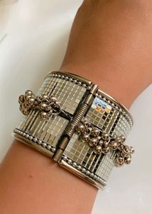Elegant Silver Bangle with Tassels