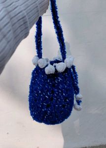 Handmade crochet pouch/sling bag