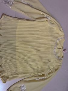 Yellow Pleated Blouse with Silver Embellishments