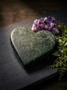 Polished heart-shaped green stone (marble finish)