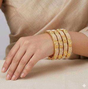 Elegant Gold Pearl Bangle Set