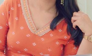 Elegant Orange Kurta Set with Intricate Embroidery