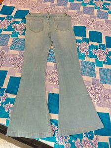 Ripped Bell Bottom Denim Jeans