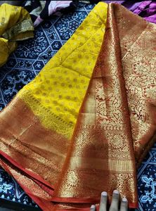 Vibrant Yellow Silk Saree with Rich Border