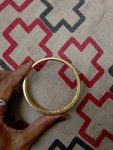 Elegant Gold Tone Bangle