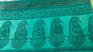 Elegant Teal  kota doria Saree with Gold Border