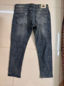 Distressed Denim Jeans