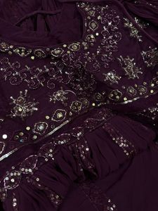 brand new Embellished gown with falling sleeves