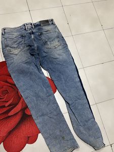 Men's Distressed Slim Fit Jeans