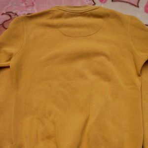 yellow sweatshirt
