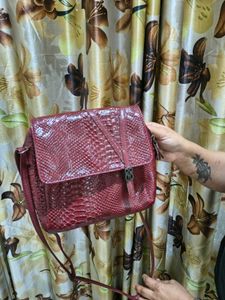 Stylish Baggit Brand maroon colour Crossbody Bag