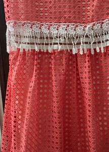 Chic Coral Lace Dress with Tassel Detail