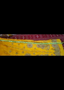 Embroidered Yellow Rajasthani poshak.