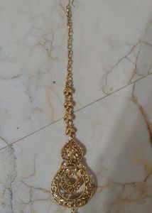 Elegant Gold Maangtika with Stones and earrings