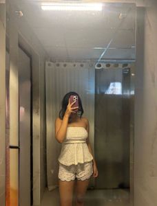 Two peplum  tops in black and white