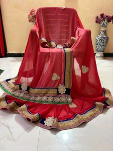 Elegant Red Embroidered pearl work Saree