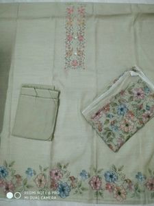 Green linen suit with floral dupatta