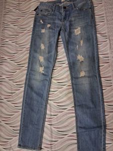 Distressed Blue Denim Jeans