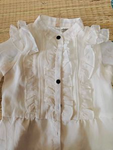 Elegant White Ruffled Blouse
