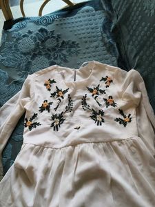 Embroidered White top