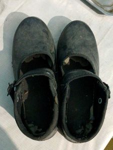Worn Black Flats
