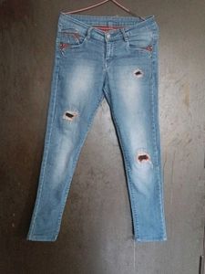 Ripped Knee Denim Jeans