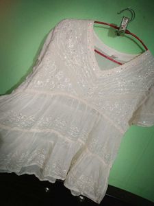 Sheer White Peplum Top with Ruffle Details
