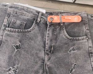 Ripped Grey Jeans