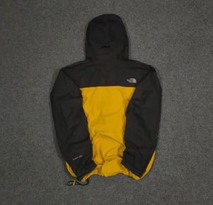 THE NORTH FACE YELLOW AND BLACK JACKET