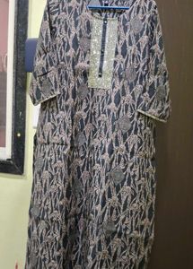 Elegant Printed Kurta with Embellished Neckline
