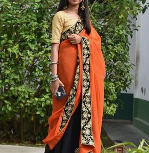 Elegant Orange Saree with Black Border