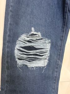 Distressed Blue Denim Jeans