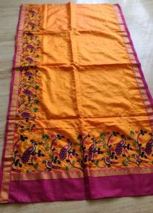 Vibrant Orange Saree with Peacock Embroidery