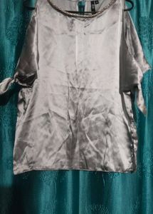 Stylish Silver Top with Embellished Neck