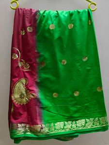 Elegant maroon saree with Green pallu.