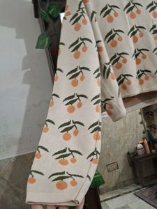 Orange Print Knit Polo Sweater