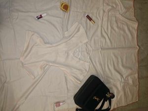 Elegant Cream Top with Cross Back Detail
