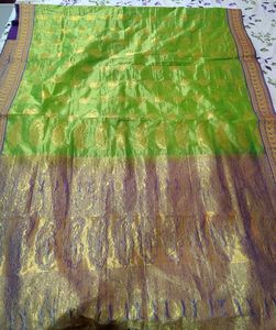 Vibrant Green Silk Saree with Paisley Motifs