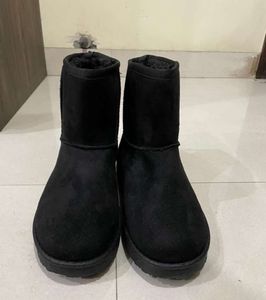 Truffle Collection Mid-Calf Length Fur Boots