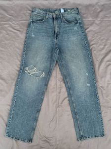 Distressed Blue Denim Jeans