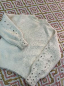 Cream fuzzy sweater with pearl details