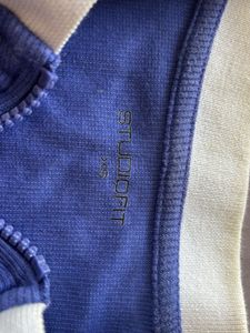 Blue "indescribable" Collared Zip-Up Top