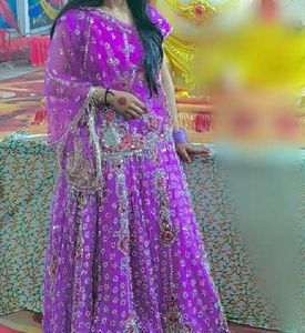 Stunning Purple Embroidered Lehenga Choli