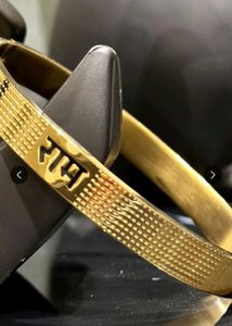 Elegant Gold Bangle with Ram Engraving