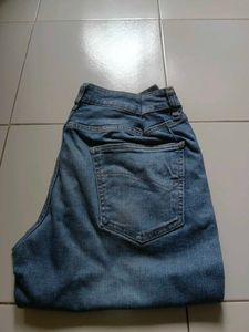 Distressed Blue Jeans with Paint Splatter