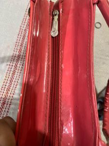 Red Handbag with Embellishments