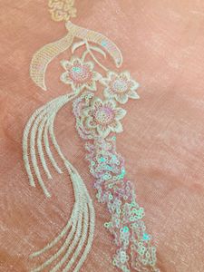Elegant Peach Saree with Delicate Embroidery